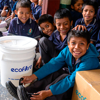 Students using Ecofiltro water filter at school in Guatemala